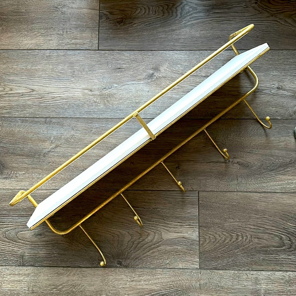 Gold coat hooks with shelf